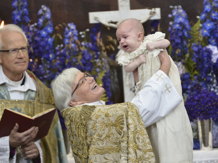 Swedish Archbishop Antje Jackelen raises Prince Nicolas 