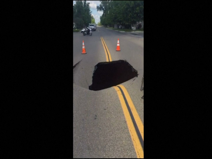 Sinkhole Forming In Street