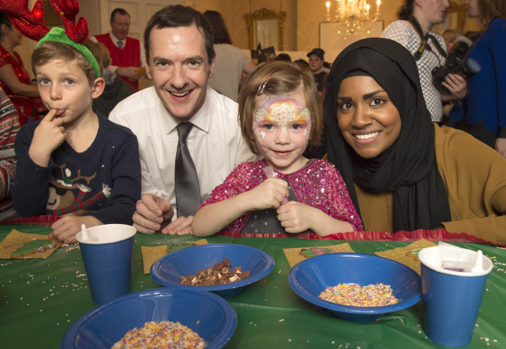 Britain's Chancellor of the Exchequer George Osborne and 'Great British Bake Off' winner Nadiya Hussain