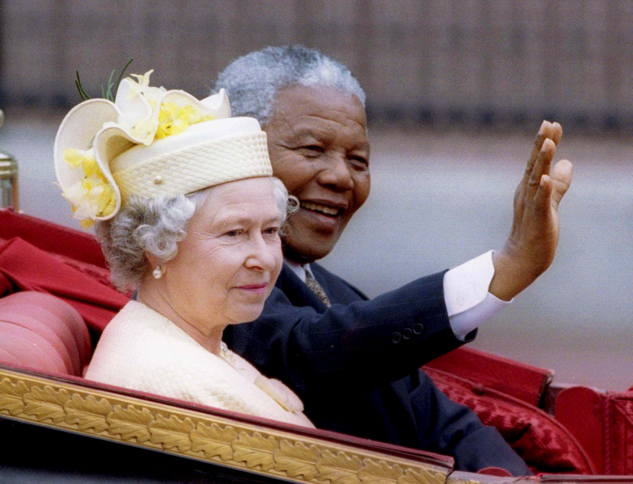 File photo of Nelson Mandela and Queen Elizabeth II 