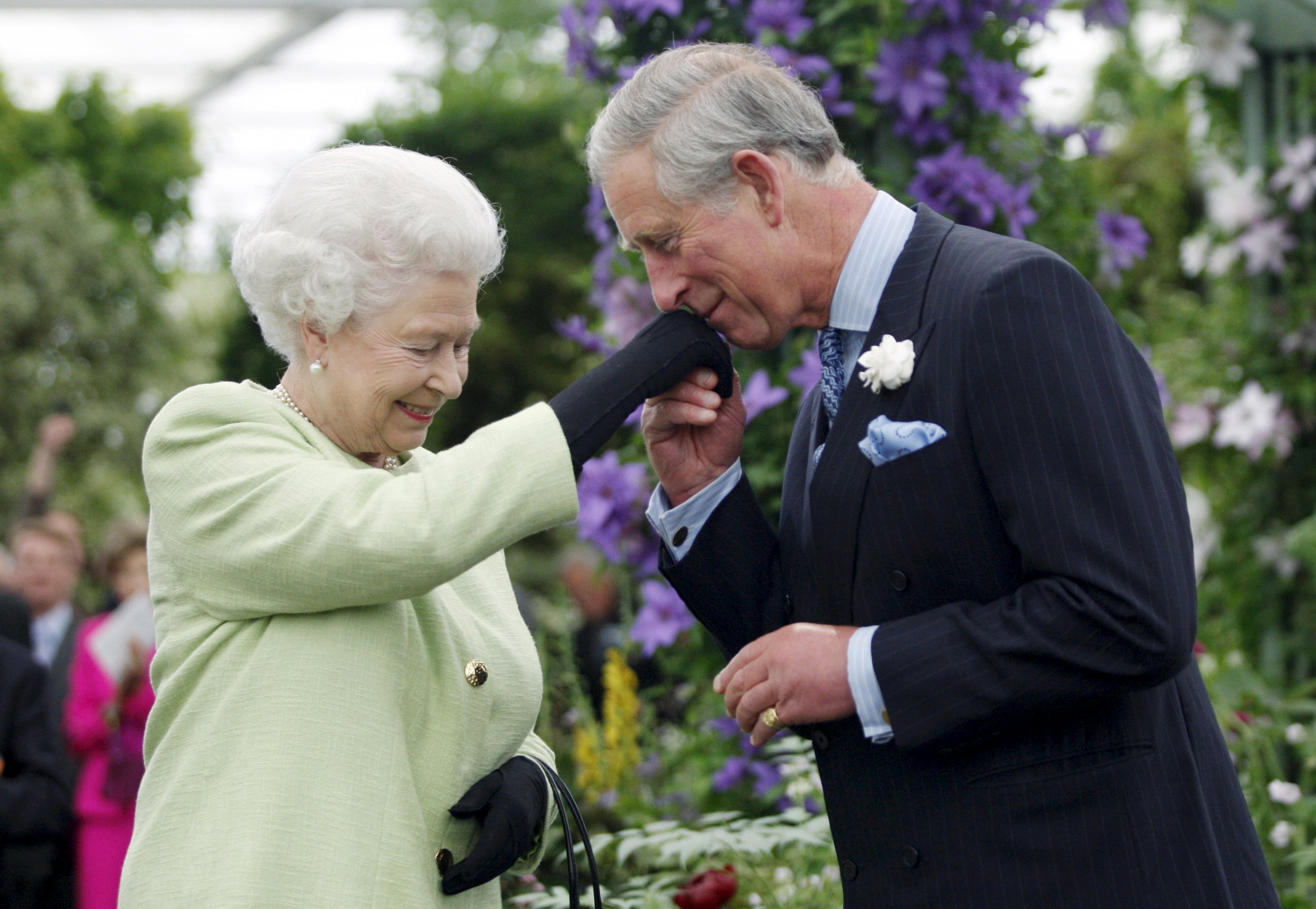 Britains Prince Charles kisses the hand of his mother, Queen Elizabeth