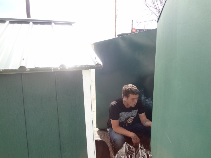 Devin Butts among the dumpsters
