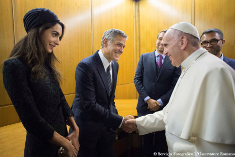 Pope Francis with US actor George Clooney and his wife Amal