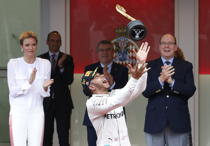 Prince Albert II of Monaco and Princess Charlene with Mercedes F1 driver Lewis Hamilton