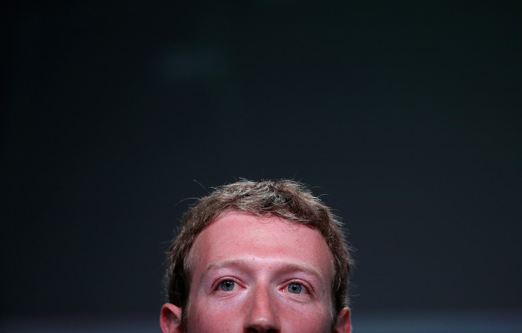 Zuckerberg Taps Laptop Camera