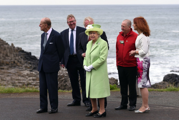 Queen Elizabeth and Prince Philip (L) visit the Giant's Causeway in Northern Ireland