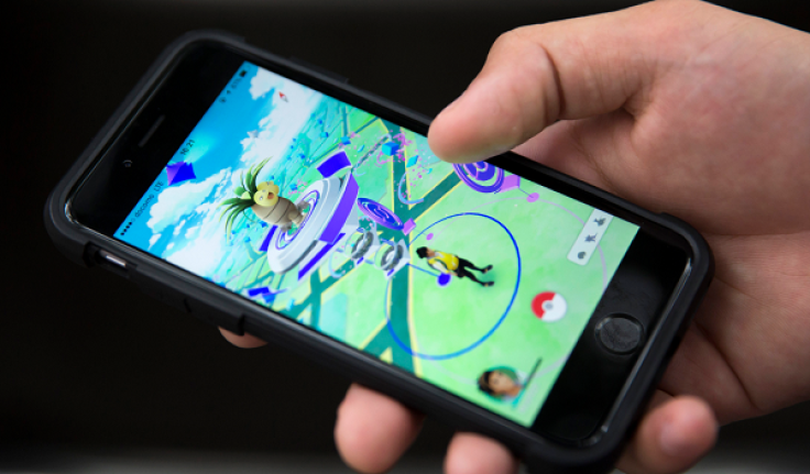 TOKYO, JAPAN - JULY 22: A man plays Pokemon Go game on a smartphone on July 22, 2016 in Tokyo, Japan.