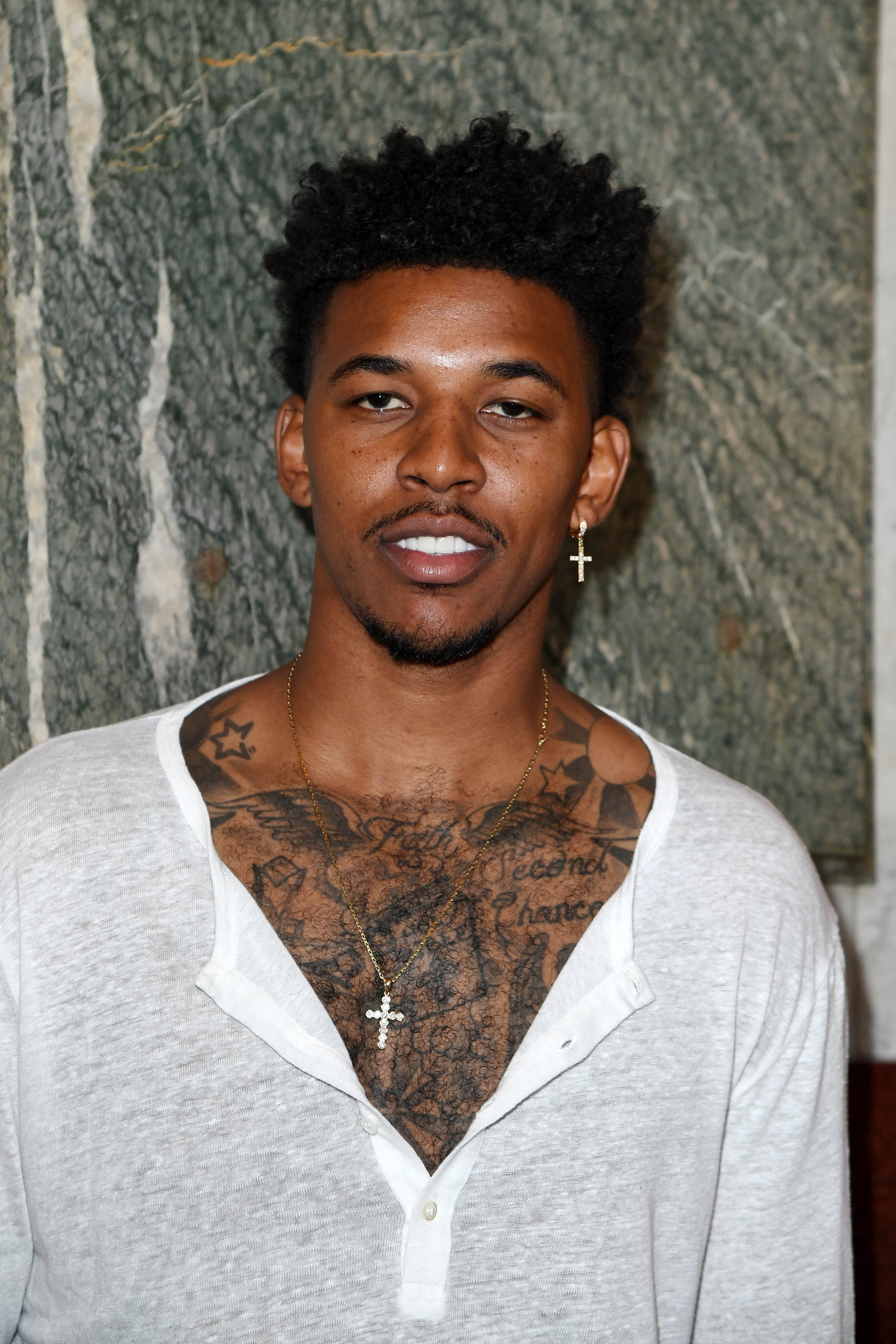 Nick Young 2023: Wife, net worth, tattoos, smoking & body facts - Taddlr