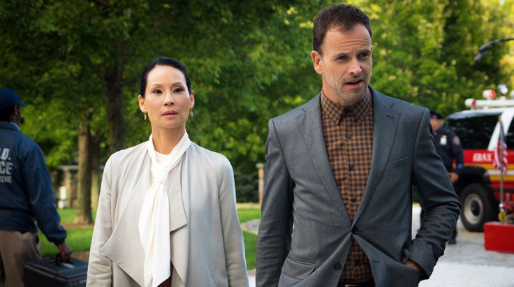 Lucy Liu as Joan, Jonny Lee Miller as Sherlock