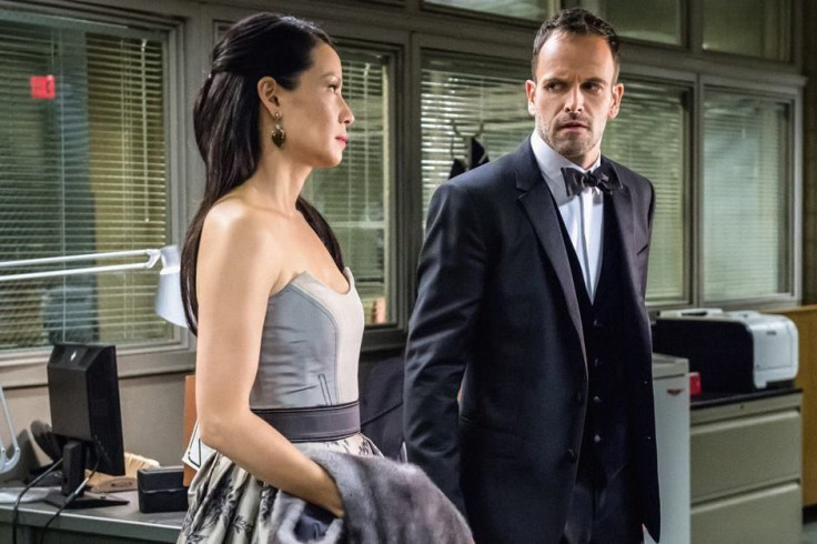 Lucy Liu as Joan, Jonny Lee Miller as Sherlock