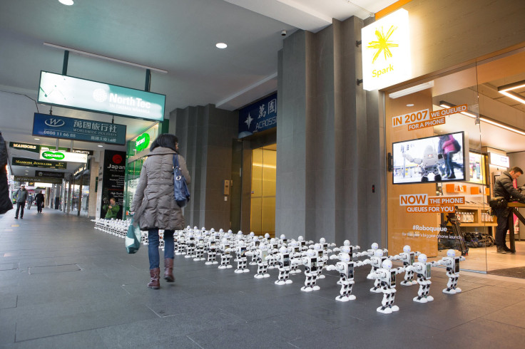100 Robots queuing for Spark customers to get phone 02