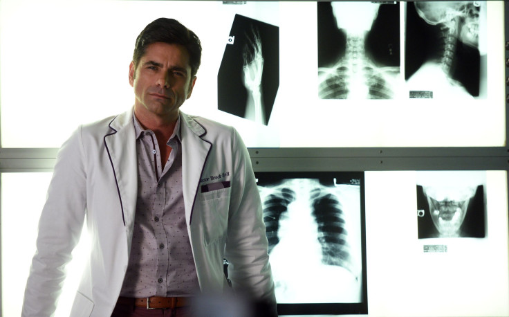 John Stamos as Dr. Brock Holt