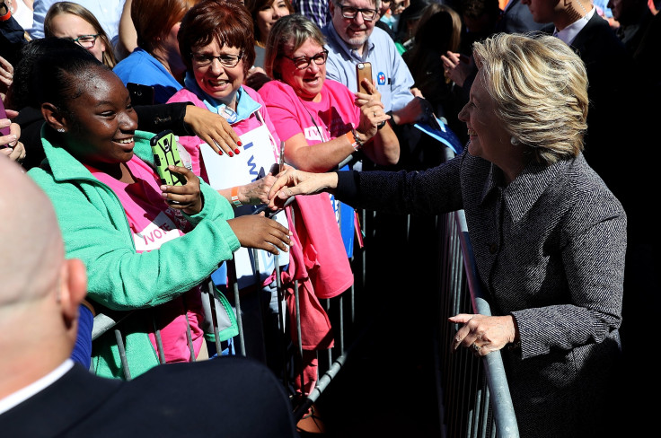 hillary shaking hands