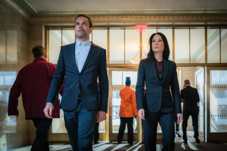 Jonny Lee Miller as Sherlock Holmes and Lucy Liu as Joan Watson