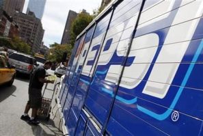 Workers unload a truck of Pepsi products in New York