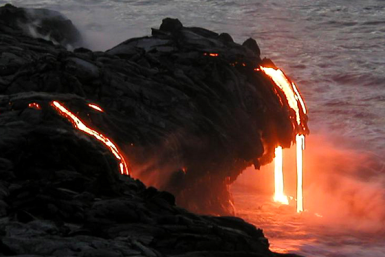 A portion of cliff collapses cutting off the ongoing flow of lava that had been spilling out of Kamokuna cliff since New Year's Eve.