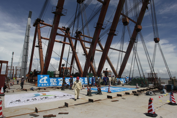 Workers at a Hong Kong bridge