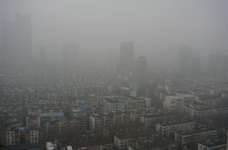 China plans to combat Beijing air pollution by creating "green necklace" around city.