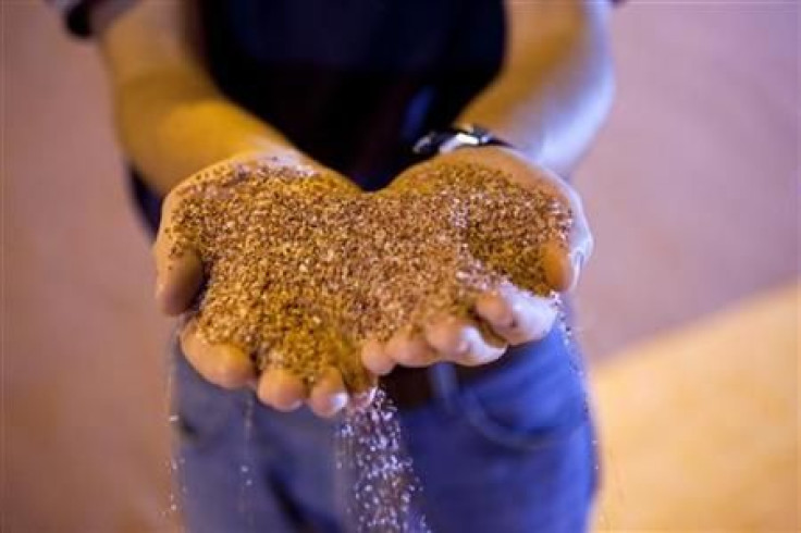 Mill manager Josh Wheeler examines a pile processed potash at the Mosaic Potash Colonsay