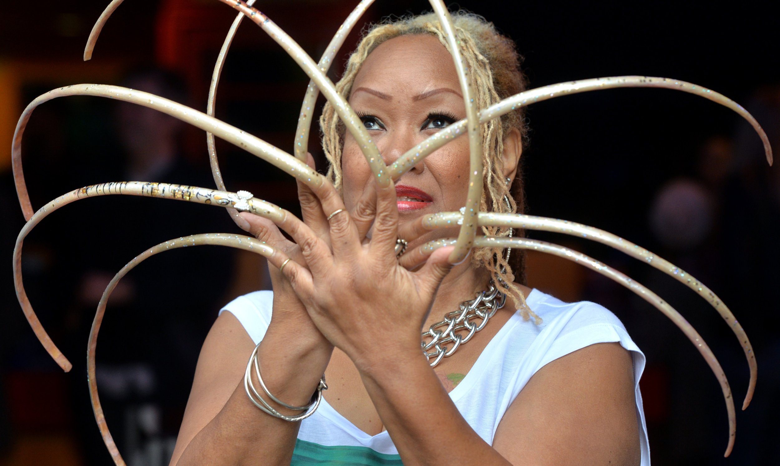 Guinness world record holders -- the longest fingernails in the world. :  r/theviralthings