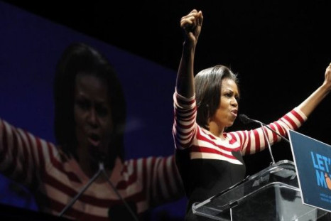 Michelle Obama Jumps in a Sack to Tackle Obesity