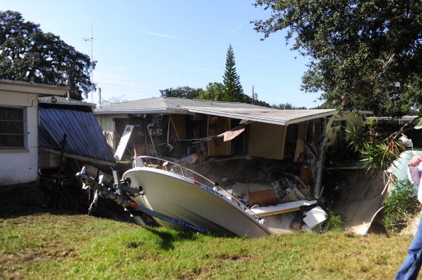 Watch Huge Sinkhole Swallows Portion Of Florida Home