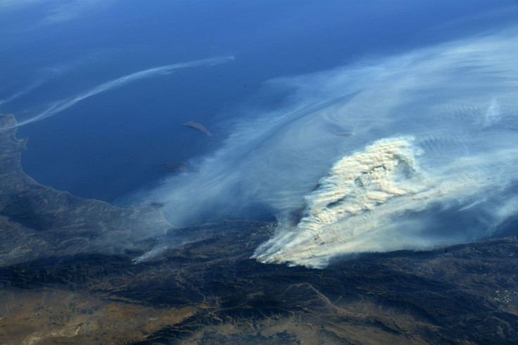 california fire from ISS, ocean