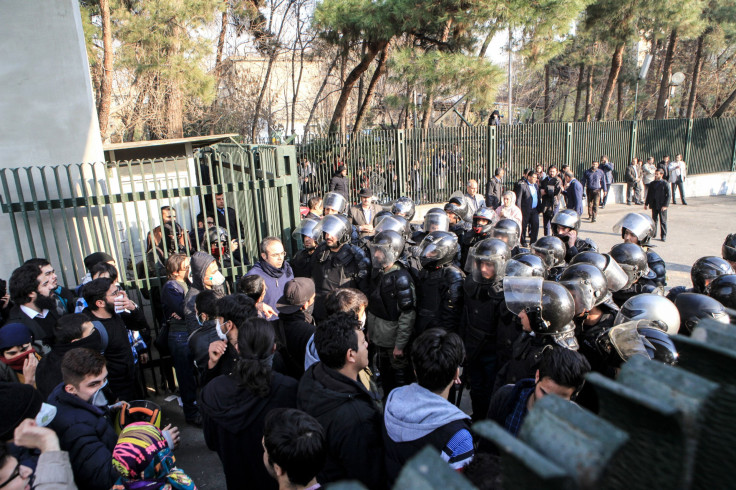 Iran protestors clash with police