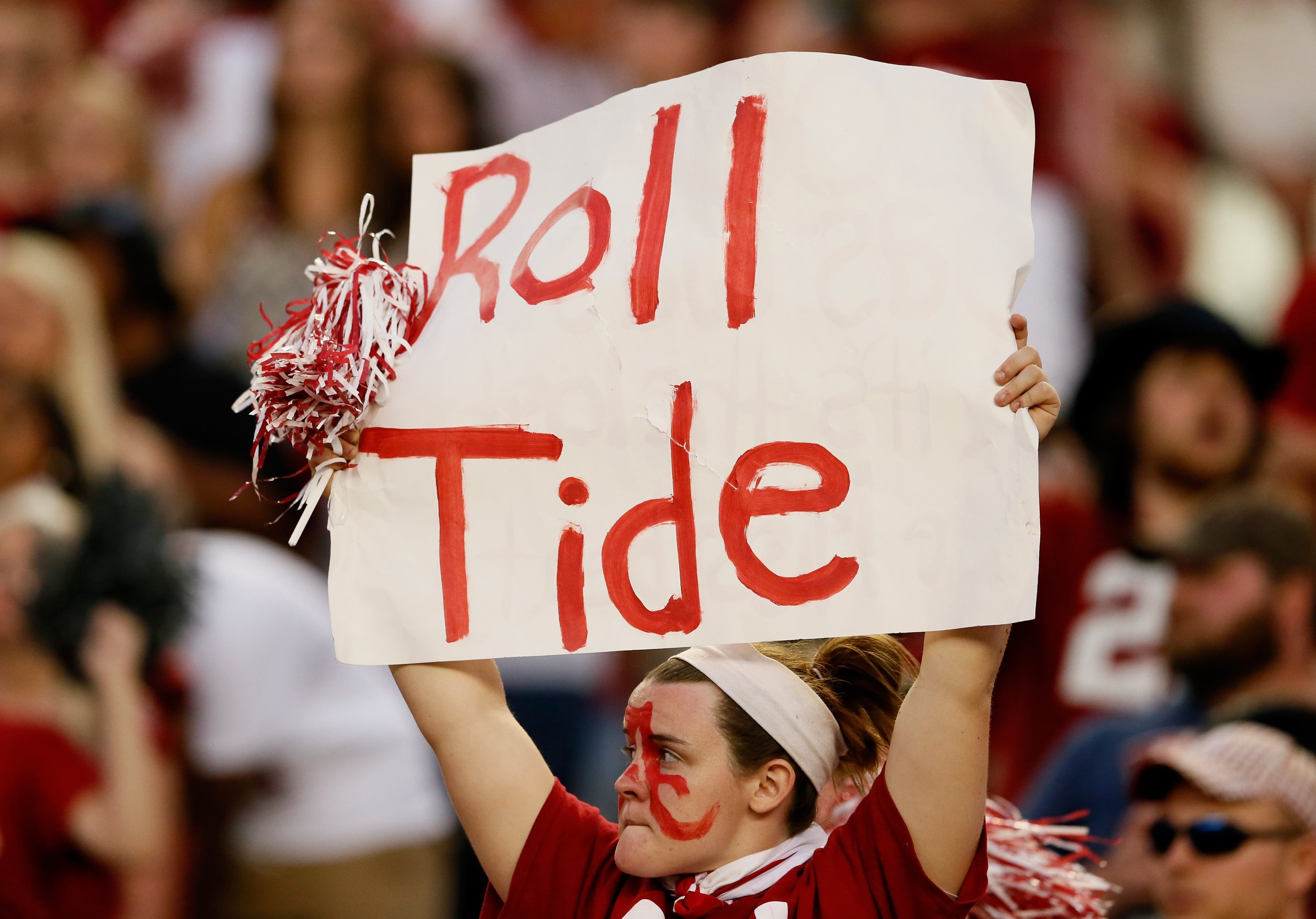 what-does-roll-tide-mean-alabama-football-fans-love-yelling-the-rally-cry