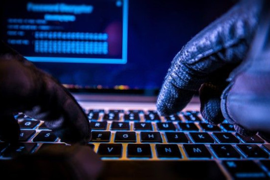 hacker-bitcoin-cryptocurrency-money-finances-laptop-illegal-getty_large
