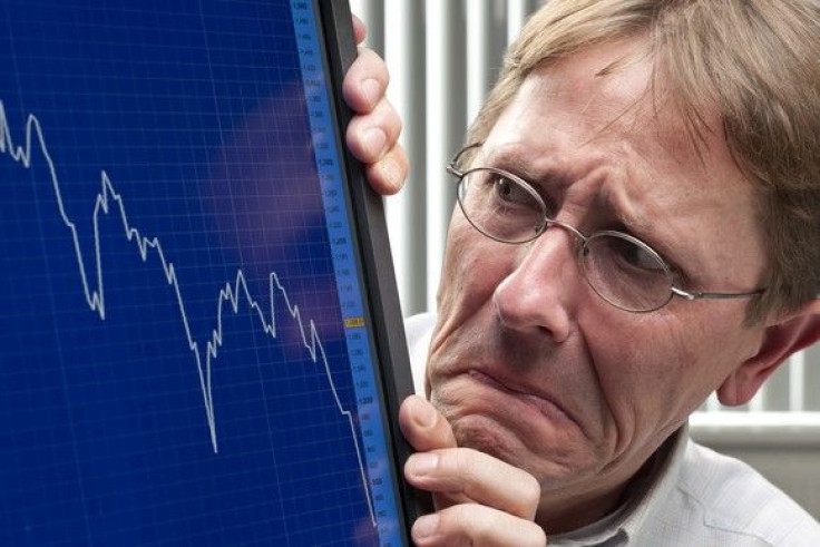 man-worried-about-sinking-stock-market-chart-getty_large