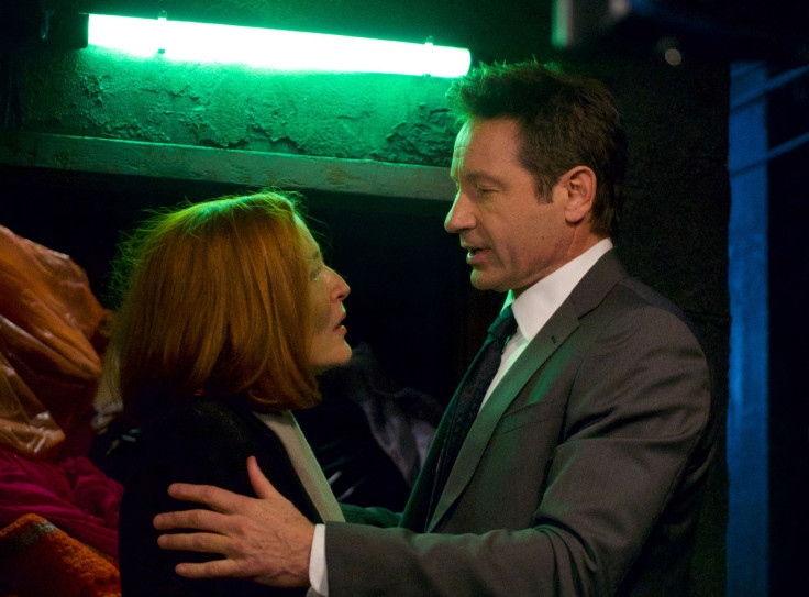 Gillian Anderson as Scully, David Duchovny as Mulder