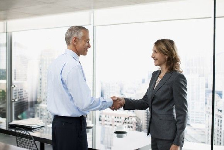 professionals-shaking-hands_gettyimages-107430233_large