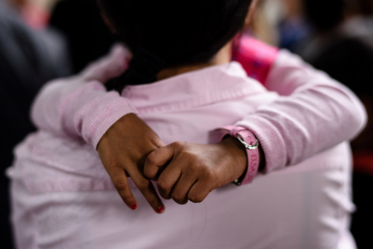 Daughter Hugging Mother 