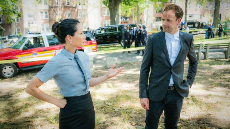 Lucy Liu as Joan, Jonny Lee Miller as Sherlock