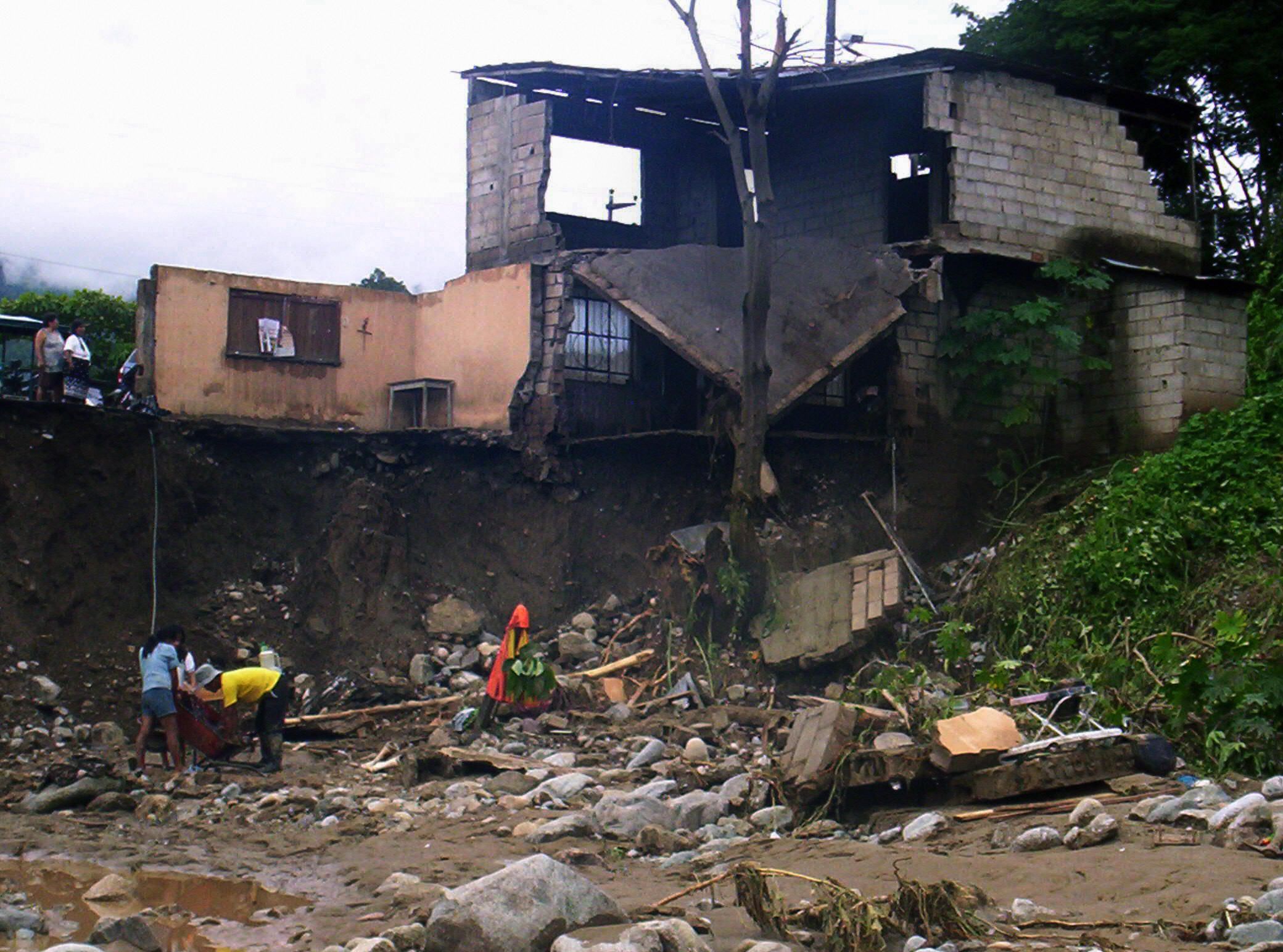 Peru Hotel Collapses In Mudslide, Dozens Killed, Injured, Photos Show