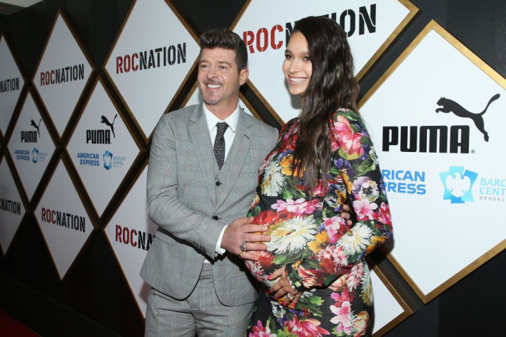 Robin Thicke and April Love Geary