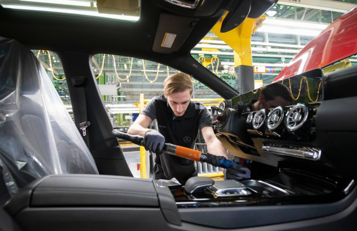 German working at the Daimler AG car factory