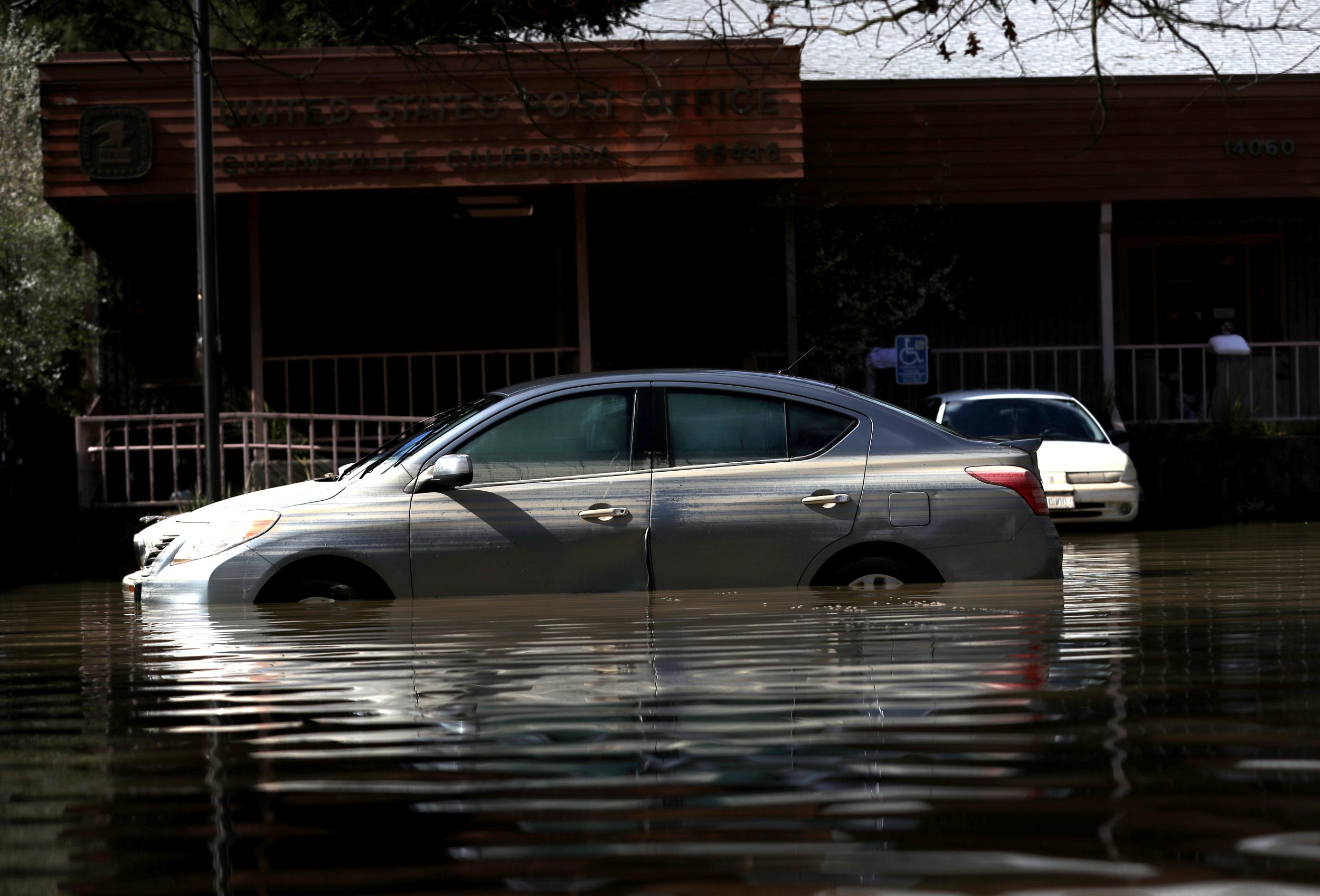 Davenport Flooding: Evacuations Underway After Barrier Fails ...