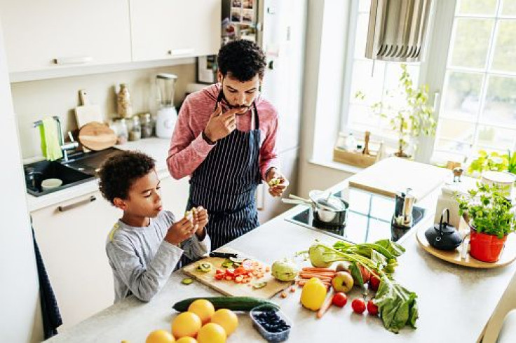 Single Dad Snacking With His Son