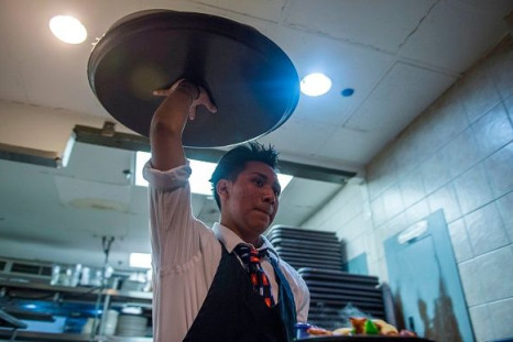 Waiter carrying food