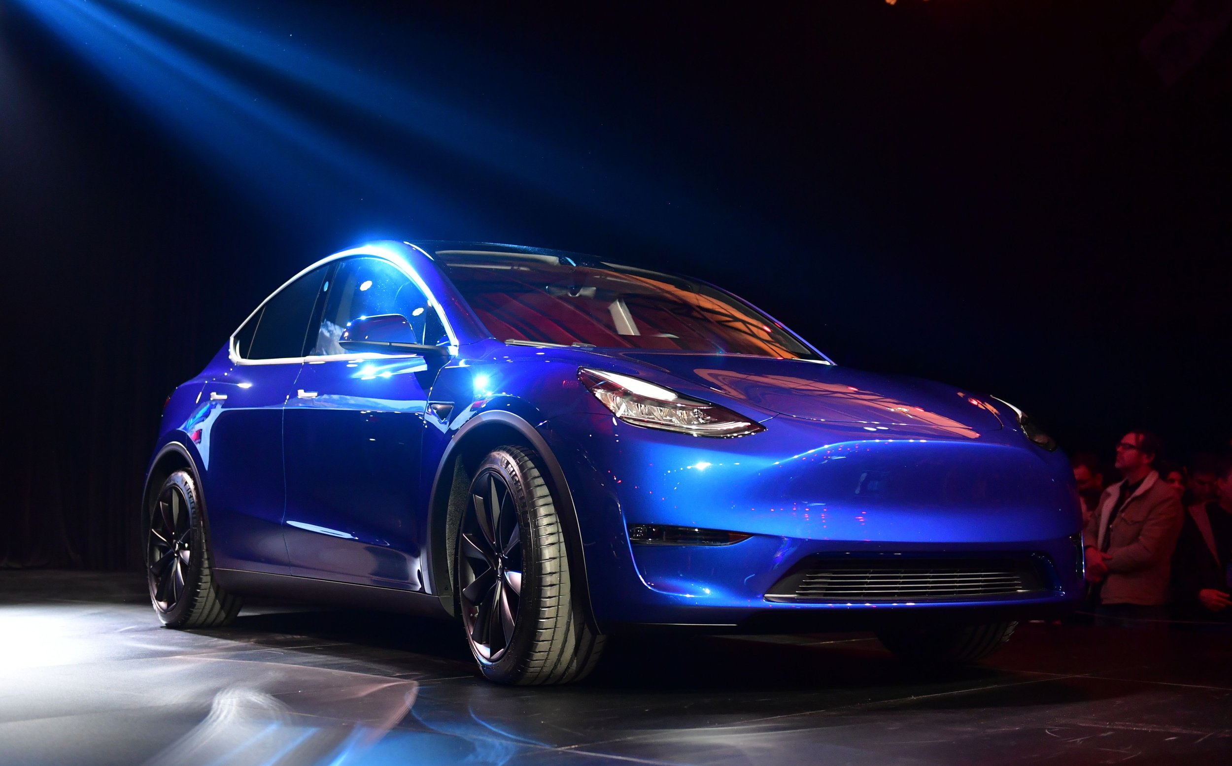 Tesla Shows Off Model Y In Deep Blue Metallic Paint Outside Seat