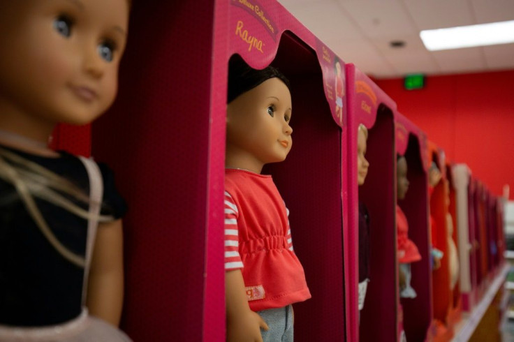 Toys made in China, such as these dolls sold at a store in the US capital, will likely see a price hike due to increased tariffs