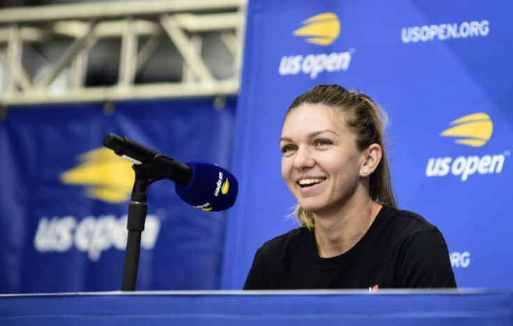 Reigning Wimbledon champion Simona Halep of Romania smiles during an interview session friday at the US Open