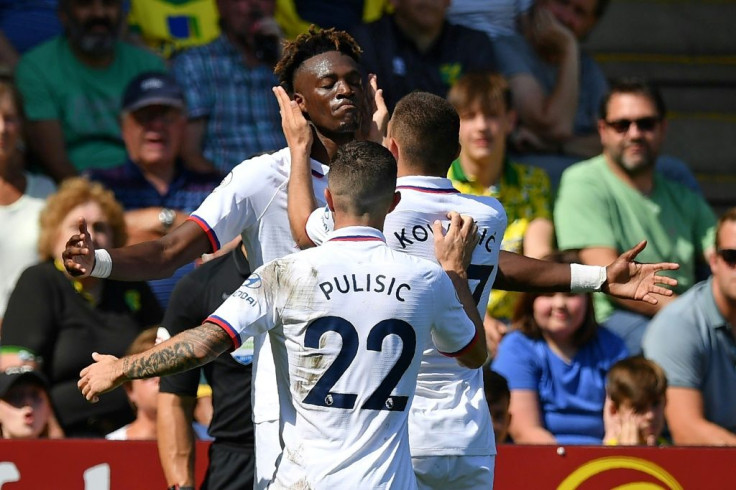 Chelsea striker Tammy Abraham celebrates with team-mates during their win at Norwich