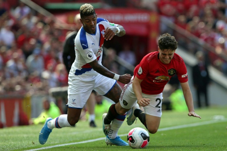 Manchester United midfielder Daniel James vies with Crystal Palace's Patrick van Aanholt