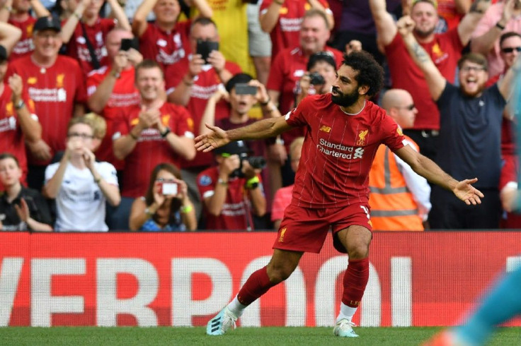 Liverpool's Mohamed Salah celebrates after scoring his second goal against Arsenal