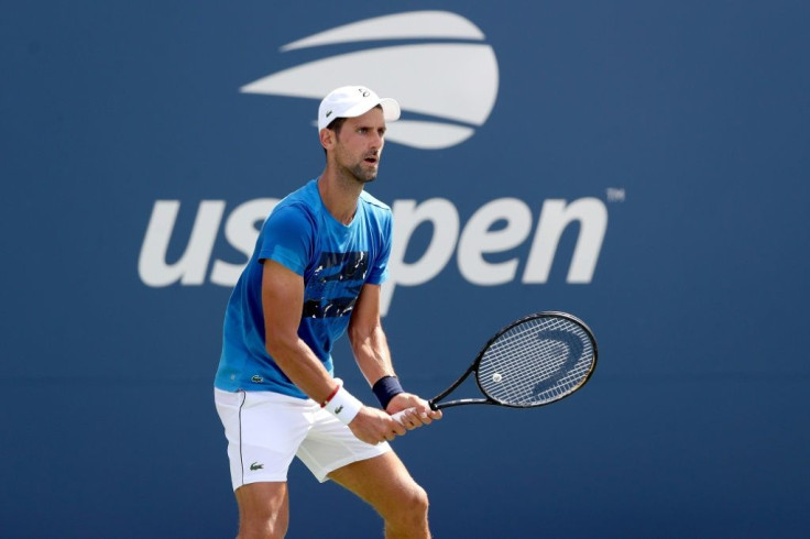 Top-seeded defending champion Novak Djokovic practices ahead of Monday's US Open start in New York