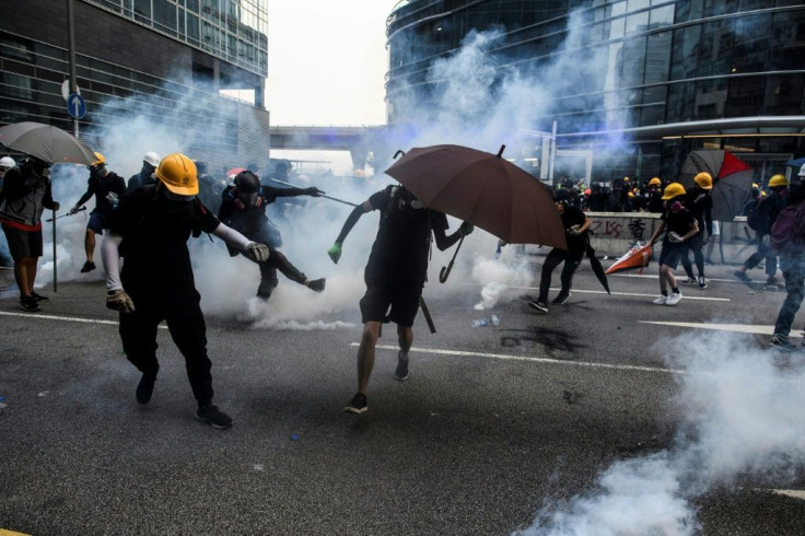 Saturday's clashes saw police baton-charge protesters and fire tear gas