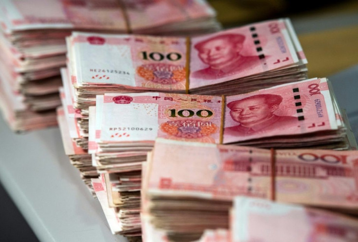 China's currency slid to its weakest point in more than 11 years on Monday amid the ongoing tensions and fears of a global downturn